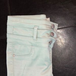 Green high waisted skinny jeans